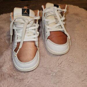 Rose gold jordan 1 mid
